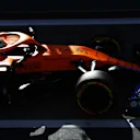 Ricciardo's MCL35M glowing in the Bahrain pitlane as he takes the wheel in the afternoon