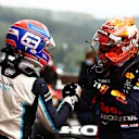 SPA, BELGIUM - AUGUST 28: Pole position qualifier Max Verstappen of Netherlands and Red Bull Racing and second place qualifier George Russell of Great Britain and Williams celebrate in parc ferme during qualifying ahead of the F1 Grand Prix of Belgium at Circuit de Spa-Francorchamps on August 28, 2021 in Spa, Belgium. (Photo by Dan Istitene - Formula 1/Formula 1 via Getty Images)