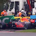SPA, BELGIUM - AUGUST 29: Sergio Perez of Mexico driving the (11) Red Bull Racing RB16B Honda crashes on his way to the grid prior to the F1 Grand Prix of Belgium at Circuit de Spa-Francorchamps on August 29, 2021 in Spa, Belgium. (Photo by Lars Baron/Getty Images)