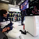 SPA, BELGIUM - AUGUST 29: Yuki Tsunoda of Japan and Scuderia AlphaTauri waits for the race to start due to a rain delay during the F1 Grand Prix of Belgium at Circuit de Spa-Francorchamps on August 29, 2021 in Spa, Belgium. (Photo by Peter Fox/Getty Images)