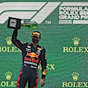 SPA, BELGIUM - AUGUST 29: Race winner Max Verstappen of Netherlands and Red Bull Racing celebrates on the podium during the F1 Grand Prix of Belgium at Circuit de Spa-Francorchamps on August 29, 2021 in Spa, Belgium. (Photo by Dan Mullan/Getty Images)