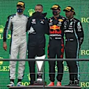SPA, BELGIUM - AUGUST 29: Race winner Max Verstappen of Netherlands and Red Bull Racing, second placed George Russell of Great Britain and Williams and third placed Lewis Hamilton of Great Britain and Mercedes GP celebrate on the podium during the F1 Grand Prix of Belgium at Circuit de Spa-Francorchamps on August 29, 2021 in Spa, Belgium. (Photo by Dan Mullan/Getty Images)