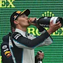 SPA, BELGIUM - AUGUST 29: Second placed George Russell of Great Britain and Williams celebrates on the podium during the F1 Grand Prix of Belgium at Circuit de Spa-Francorchamps on August 29, 2021 in Spa, Belgium. (Photo by Dan Mullan/Getty Images)