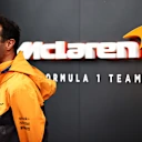 SAO PAULO, BRAZIL - NOVEMBER 13: Daniel Ricciardo of Australia and McLaren F1 looks on in the Paddock before practice ahead of the F1 Grand Prix of Brazil at Autodromo Jose Carlos Pace on November 13, 2021 in Sao Paulo, Brazil. (Photo by Mark Thompson/Getty Images)