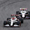 SAO PAULO, BRAZIL - NOVEMBER 13: Kimi Raikkonen of Finland driving the (7) Alfa Romeo Racing C41 Ferrari leads Mick Schumacher of Germany driving the (47) Haas F1 Team VF-21 Ferrari during the sprint ahead of the F1 Grand Prix of Brazil at Autodromo Jose Carlos Pace on November 13, 2021 in Sao Paulo, Brazil. (Photo by Bryn Lennon - Formula 1/Formula 1 via Getty Images)