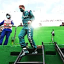 SAO PAULO, BRAZIL - NOVEMBER 13: Sebastian Vettel of Germany and Aston Martin F1 Team prepares to drive on the grid during the sprint ahead of the F1 Grand Prix of Brazil at Autodromo Jose Carlos Pace on November 13, 2021 in Sao Paulo, Brazil. (Photo by Mark Thompson/Getty Images)