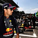 SAO PAULO, BRAZIL - NOVEMBER 14: Sergio Perez of Mexico and Red Bull Racing prepares to drive on the grid during the F1 Grand Prix of Brazil at Autodromo Jose Carlos Pace on November 14, 2021 in Sao Paulo, Brazil. (Photo by Mark Thompson/Getty Images)