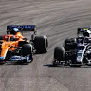 SAO PAULO, BRAZIL - NOVEMBER 14: Pierre Gasly of France driving the (10) Scuderia AlphaTauri AT02 Honda leads Daniel Ricciardo of Australia driving the (3) McLaren F1 Team MCL35M Mercedes during the F1 Grand Prix of Brazil at Autodromo Jose Carlos Pace on November 14, 2021 in Sao Paulo, Brazil. (Photo by Bryn Lennon - Formula 1/Formula 1 via Getty Images)