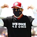 SAO PAULO, BRAZIL - NOVEMBER 14: Kimi Raikkonen of Finland and Alfa Romeo Racing looks on from the grid prior to the F1 Grand Prix of Brazil at Autodromo Jose Carlos Pace on November 14, 2021 in Sao Paulo, Brazil. (Photo by Bryn Lennon - Formula 1/Formula 1 via Getty Images)