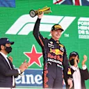 SAO PAULO, BRAZIL - NOVEMBER 14: Second placed Max Verstappen of Netherlands and Red Bull Racing celebrates on the podium during the F1 Grand Prix of Brazil at Autodromo Jose Carlos Pace on November 14, 2021 in Sao Paulo, Brazil. (Photo by Lars Baron/Getty Images)