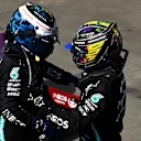SAO PAULO, BRAZIL - NOVEMBER 14: Race winner Lewis Hamilton of Great Britain and Mercedes GP celebrates with teammate and third placed Valtteri Bottas of Finland and Mercedes GP in parc ferme during the F1 Grand Prix of Brazil at Autodromo Jose Carlos Pace on November 14, 2021 in Sao Paulo, Brazil. (Photo by Clive Mason - Formula 1/Formula 1 via Getty Images)