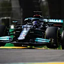 IMOLA, ITALY - APRIL 16: Lewis Hamilton of Great Britain driving the (44) Mercedes AMG Petronas F1 Team Mercedes W12 launches off a raised kerb during practice ahead of the F1 Grand Prix of Emilia Romagna at Autodromo Enzo e Dino Ferrari on April 16, 2021 in Imola, Italy. (Photo by Clive Mason - Formula 1/Formula 1 via Getty Images)