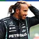 IMOLA, ITALY - APRIL 17: Pole position qualifier Lewis Hamilton of Great Britain and Mercedes GP looks on in parc ferme during qualifying ahead of the F1 Grand Prix of Emilia Romagna at Autodromo Enzo e Dino Ferrari on April 17, 2021 in Imola, Italy. (Photo by Bryn Lennon/Getty Images)