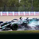 IMOLA, ITALY - APRIL 18: Pierre Gasly of France driving the (10) Scuderia AlphaTauri AT02 Honda and Lance Stroll of Canada driving the (18) Aston Martin AMR21 Mercedes compete for position on track during the F1 Grand Prix of Emilia Romagna at Autodromo Enzo e Dino Ferrari on April 18, 2021 in Imola, Italy. (Photo by Bryn Lennon/Getty Images)