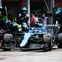 IMOLA, ITALY - APRIL 18: Fernando Alonso of Spain driving the (14) Alpine A521 Renault stops in the Pitlane during the F1 Grand Prix of Emilia Romagna at Autodromo Enzo e Dino Ferrari on April 18, 2021 in Imola, Italy. (Photo by Peter Fox/Getty Images)