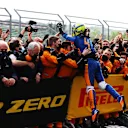 IMOLA, ITALY - APRIL 18: Third placed Lando Norris of Great Britain and McLaren F1 celebrates in parc ferme with his team during the F1 Grand Prix of Emilia Romagna at Autodromo Enzo e Dino Ferrari on April 18, 2021 in Imola, Italy. (Photo by Bryn Lennon/Getty Images)