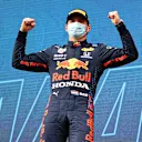 IMOLA, ITALY - APRIL 18: Race winner Max Verstappen of Netherlands and Red Bull Racing celebrates on the podium during the F1 Grand Prix of Emilia Romagna at Autodromo Enzo e Dino Ferrari on April 18, 2021 in Imola, Italy. (Photo by Bryn Lennon/Getty Images)