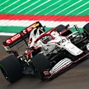 IMOLA, ITALY - APRIL 18: Antonio Giovinazzi of Italy driving the (99) Alfa Romeo Racing C41 Ferrari launches off a raised kerb during the F1 Grand Prix of Emilia Romagna at Autodromo Enzo e Dino Ferrari on April 18, 2021 in Imola, Italy. (Photo by Dan Istitene - Formula 1/Formula 1 via Getty Images)