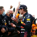 IMOLA, ITALY - APRIL 18: Race winner Max Verstappen of Netherlands and Red Bull Racing talks with Red Bull Racing Team Principal Christian Horner and Red Bull Racing Team Consultant Dr Helmut Marko in parc ferme after the F1 Grand Prix of Emilia Romagna at Autodromo Enzo e Dino Ferrari on April 18, 2021 in Imola, Italy. (Photo by Bryn Lennon/Getty Images)