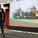 IMOLA, ITALY - APRIL 18: Second placed Lewis Hamilton of Great Britain and Mercedes GP watches a replay of the start of the race on a screen in parc ferme after the F1 Grand Prix of Emilia Romagna at Autodromo Enzo e Dino Ferrari on April 18, 2021 in Imola, Italy. (Photo by Bryn Lennon/Getty Images)