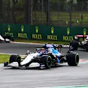 IMOLA, ITALY - APRIL 18: George Russell of Great Britain driving the (63) Williams Racing FW43B Mercedes leads Kimi Raikkonen of Finland driving the (7) Alfa Romeo Racing C41 Ferrari on track during the F1 Grand Prix of Emilia Romagna at Autodromo Enzo e Dino Ferrari on April 18, 2021 in Imola, Italy. (Photo by Clive Mason - Formula 1/Formula 1 via Getty Images)