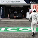 LE CASTELLET, FRANCE - JUNE 19: Yuki Tsunoda of Japan and Scuderia AlphaTauri walks in the Pitlane after retiring from qualifying ahead of the F1 Grand Prix of France at Circuit Paul Ricard on June 19, 2021 in Le Castellet, France. (Photo by Peter Fox/Getty Images)