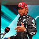 LE CASTELLET, FRANCE - JUNE 19: Second placed qualifier Lewis Hamilton of Great Britain and Mercedes GP is interviewed after qualifying ahead of the F1 Grand Prix of France at Circuit Paul Ricard on June 19, 2021 in Le Castellet, France. (Photo by Nicolas Tucat - Pool/Getty Images)