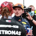 LE CASTELLET, FRANCE - JUNE 19: Pole position qualifier Max Verstappen of Netherlands and Red Bull Racing and second placed qualifier Lewis Hamilton of Great Britain and Mercedes GP interact in parc ferme during qualifying ahead of the F1 Grand Prix of France at Circuit Paul Ricard on June 19, 2021 in Le Castellet, France. (Photo by Mark Thompson/Getty Images)