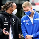 LE CASTELLET, FRANCE - JUNE 20: Lewis Hamilton of Great Britain and Mercedes GP talks with Mick Schumacher of Germany and Haas F1 during the F1 Grand Prix of France at Circuit Paul Ricard on June 20, 2021 in Le Castellet, France. (Photo by Peter Fox/Getty Images)