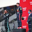 LE CASTELLET, FRANCE - JUNE 20: Second placed Lewis Hamilton of Great Britain and Mercedes GP, race winner Max Verstappen of Netherlands and Red Bull Racing and third placed Sergio Perez of Mexico and Red Bull Racing stand on the podium during the F1 Grand Prix of France at Circuit Paul Ricard on June 20, 2021 in Le Castellet, France. (Photo by Joe Portlock - Formula 1/Formula 1 via Getty Images)