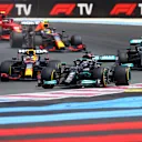 LE CASTELLET, FRANCE - JUNE 20: Lewis Hamilton of Great Britain driving the (44) Mercedes AMG Petronas F1 Team Mercedes W12 leads Max Verstappen of the Netherlands driving the (33) Red Bull Racing RB16B Honda and the rest of the field at the start of the race during the F1 Grand Prix of France at Circuit Paul Ricard on June 20, 2021 in Le Castellet, France. (Photo by Dan Istitene - Formula 1/Formula 1 via Getty Images)