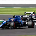 NORTHAMPTON, ENGLAND - JULY 17: Esteban Ocon of France driving the (31) Alpine A521 Renault leads Pierre Gasly of France driving the (10) Scuderia AlphaTauri AT02 Honda during the Sprint for the F1 Grand Prix of Great Britain at Silverstone on July 17, 2021 in Northampton, England. (Photo by Bryn Lennon - Formula 1/Formula 1 via Getty Images)