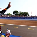 NORTHAMPTON, ENGLAND - JULY 17: Winner Max Verstappen of Netherlands and Red Bull Racing waves to the crowd on the Victory Lap during the Sprint for the F1 Grand Prix of Great Britain at Silverstone on July 17, 2021 in Northampton, England. (Photo by Dan Istitene - Formula 1/Formula 1 via Getty Images)