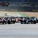 NORTHAMPTON, ENGLAND - JULY 17: Max Verstappen of the Netherlands driving the (33) Red Bull Racing RB16B Honda leads the field into turn one at the start during the Sprint for the F1 Grand Prix of Great Britain at Silverstone on July 17, 2021 in Northampton, England. (Photo by Michael Regan/Getty Images)