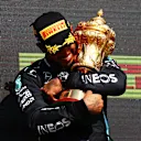 NORTHAMPTON, ENGLAND - JULY 18: Race winner Lewis Hamilton of Great Britain and Mercedes GP celebrates on the podium during the F1 Grand Prix of Great Britain at Silverstone on July 18, 2021 in Northampton, England. (Photo by Dan Istitene - Formula 1/Formula 1 via Getty Images)