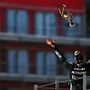 NORTHAMPTON, ENGLAND - JULY 18: Race winner Lewis Hamilton of Great Britain and Mercedes GP celebrates on the podium during the F1 Grand Prix of Great Britain at Silverstone on July 18, 2021 in Northampton, England. (Photo by Joe Portlock - Formula 1/Formula 1 via Getty Images)