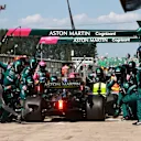 NORTHAMPTON, ENGLAND - JULY 18: Lance Stroll of Canada driving the (18) Aston Martin AMR21 Mercedes makes a pitstop during the F1 Grand Prix of Great Britain at Silverstone on July 18, 2021 in Northampton, England. (Photo by Mark Thompson/Getty Images)