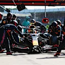 NORTHAMPTON, ENGLAND - JULY 18: Sergio Perez of Mexico driving the (11) Red Bull Racing RB16B Honda makes a pitstop during the F1 Grand Prix of Great Britain at Silverstone on July 18, 2021 in Northampton, England. (Photo by Mark Thompson/Getty Images)