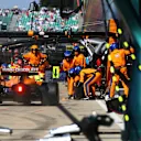 NORTHAMPTON, ENGLAND - JULY 18: Daniel Ricciardo of Australia driving the (3) McLaren F1 Team MCL35M Mercedes makes a pitstop during the F1 Grand Prix of Great Britain at Silverstone on July 18, 2021 in Northampton, England. (Photo by Mark Thompson/Getty Images)