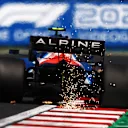BUDAPEST, HUNGARY - JULY 30: Sparks fly behind Esteban Ocon of France driving the (31) Alpine A521 Renault during practice ahead of the F1 Grand Prix of Hungary at Hungaroring on July 30, 2021 in Budapest, Hungary. (Photo by Bryn Lennon/Getty Images)