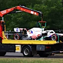 BUDAPEST, HUNGARY - JULY 31: The car of Mick Schumacher of Germany and Haas F1 is removed from the track after a crash during final practice ahead of the F1 Grand Prix of Hungary at Hungaroring on July 31, 2021 in Budapest, Hungary. (Photo by Bryn Lennon/Getty Images)