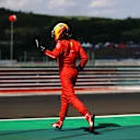 BUDAPEST, HUNGARY - JULY 31: Carlos Sainz of Spain driving the (55) Scuderia Ferrari SF21 walks from his car after a crash during qualifying ahead of the F1 Grand Prix of Hungary at Hungaroring on July 31, 2021 in Budapest, Hungary. (Photo by Bryn Lennon/Getty Images)