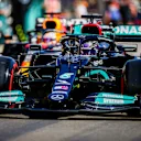BUDAPEST, HUNGARY - JULY 31: Lewis Hamilton of Mercedes and Great Britain leads Max Verstappen of Red Bull Racing and The Netherlands as they go out for their final qualifying lap during qualifying ahead of the F1 Grand Prix of Hungary at Hungaroring on July 31, 2021 in Budapest, Hungary. (Photo by Peter Fox/Getty Images)