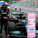 BUDAPEST, HUNGARY - AUGUST 01: Third placed Lewis Hamilton of Great Britain and Mercedes GP walks from his car in parc ferme during the F1 Grand Prix of Hungary at Hungaroring on August 01, 2021 in Budapest, Hungary. (Photo by Florion Goga - Pool/Getty Images)