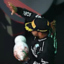 BUDAPEST, HUNGARY - AUGUST 01: Third placed Lewis Hamilton of Great Britain and Mercedes GP celebrates on the podium during the F1 Grand Prix of Hungary at Hungaroring on August 01, 2021 in Budapest, Hungary. (Photo by Bryn Lennon/Getty Images)