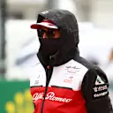 BUDAPEST, HUNGARY - AUGUST 01: Kimi Raikkonen of Finland and Alfa Romeo Racing looks on from the grid before the F1 Grand Prix of Hungary at Hungaroring on August 01, 2021 in Budapest, Hungary. (Photo by Bryn Lennon/Getty Images)