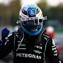MONZA, ITALY - SEPTEMBER 10: Pole position qualifier Valtteri Bottas of Finland and Mercedes GP celebrates in parc ferme during qualifying ahead of the F1 Grand Prix of Italy at Autodromo di Monza on September 10, 2021 in Monza, Italy. (Photo by Dan Istitene - Formula 1/Formula 1 via Getty Images)