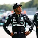 MONZA, ITALY - SEPTEMBER 10: Second place qualifier Lewis Hamilton of Great Britain and Mercedes GP looks on in parc ferme during qualifying ahead of the F1 Grand Prix of Italy at Autodromo di Monza on September 10, 2021 in Monza, Italy. (Photo by Bryn Lennon/Getty Images)