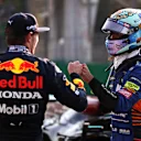 MONZA, ITALY - SEPTEMBER 11: Second place finisher Max Verstappen of Netherlands and Red Bull Racing talks with third place finisher Daniel Ricciardo of Australia and McLaren F1 in parc ferme during the Sprint ahead of the F1 Grand Prix of Italy at Autodromo di Monza on September 11, 2021 in Monza, Italy. (Photo by Lars Baron/Getty Images)