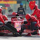 MONZA, ITALY - SEPTEMBER 12: Charles Leclerc of Monaco driving the (16) Scuderia Ferrari SF21 makes a pitstop during the F1 Grand Prix of Italy at Autodromo di Monza on September 12, 2021 in Monza, Italy. (Photo by Peter Fox/Getty Images)